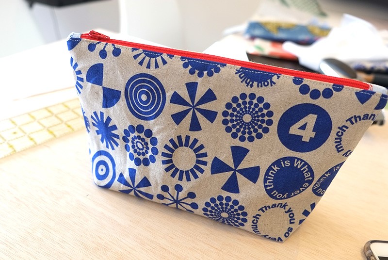 Zipper pouch with online tabs